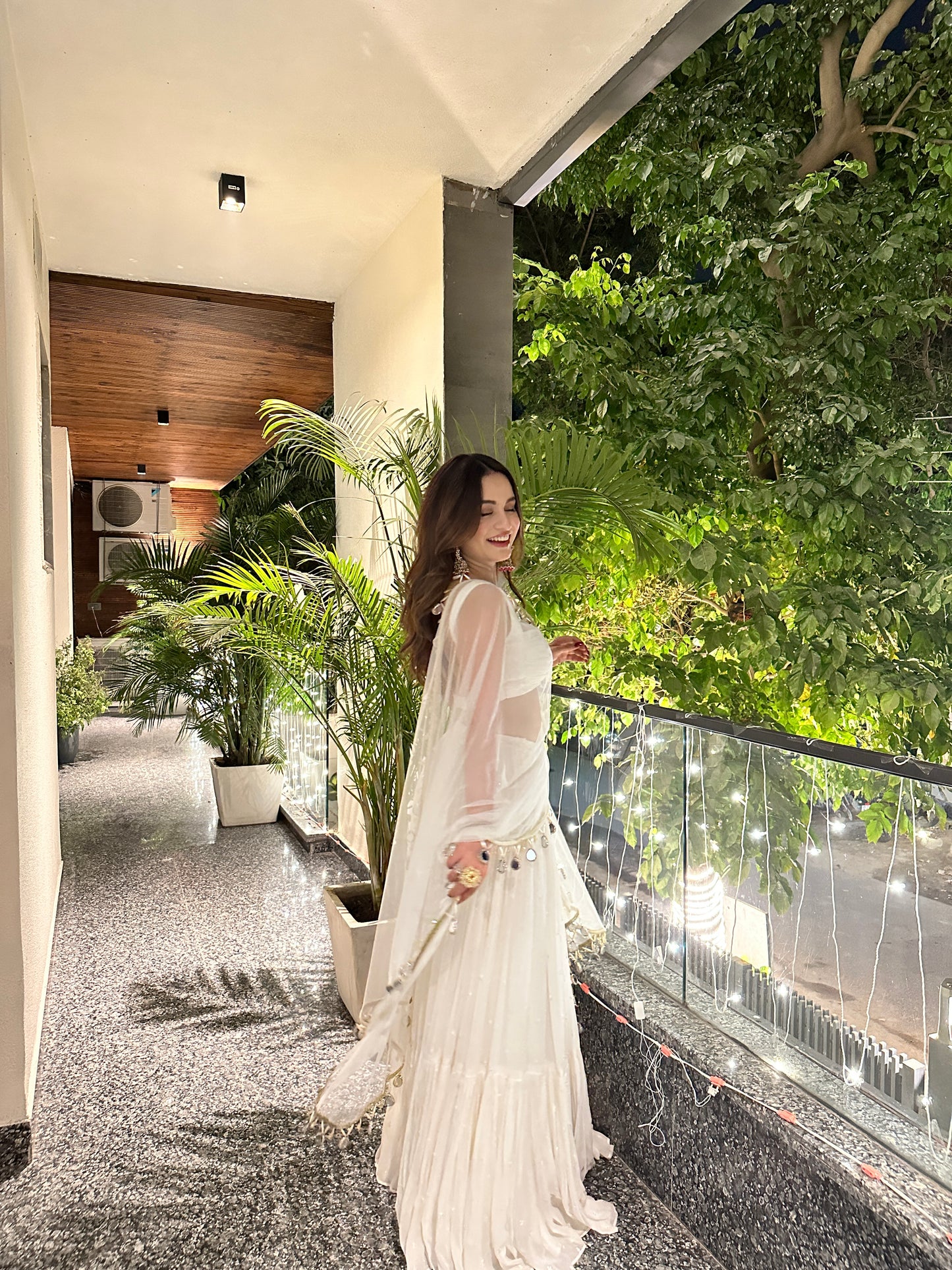 Elegant white Hans Lehnga by Imagine By Shiwali featuring intricate embroidery and traditional design on smooth fabric.