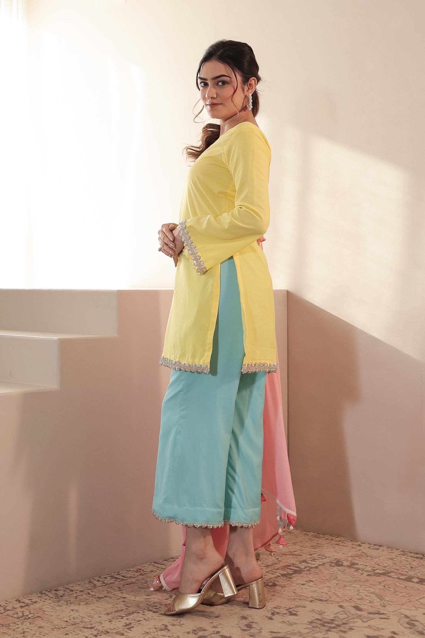 Imagine by Shiwali Taara 3-color straight suit featuring a sleek design and vibrant colors, displayed on a hanger.