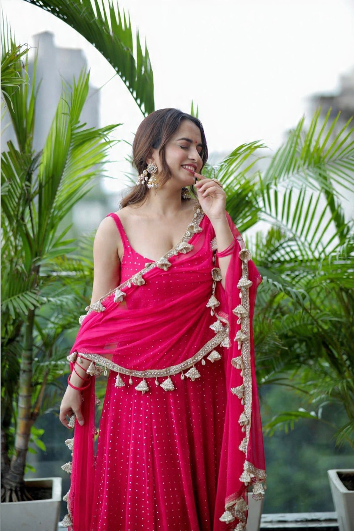 Hot pink Dolly Anarkali dress by Imagine By Shiwali, featuring intricate embroidery and flowy fabric.