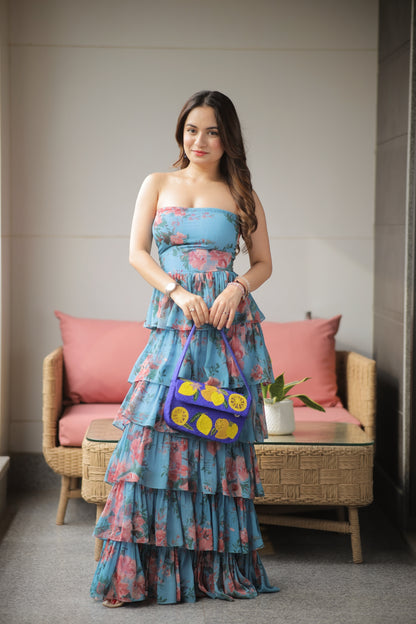 Sophia blue tiered ruffle tube gown by Imagine By Shiwali, featuring a strapless design with flowing ruffled layers.