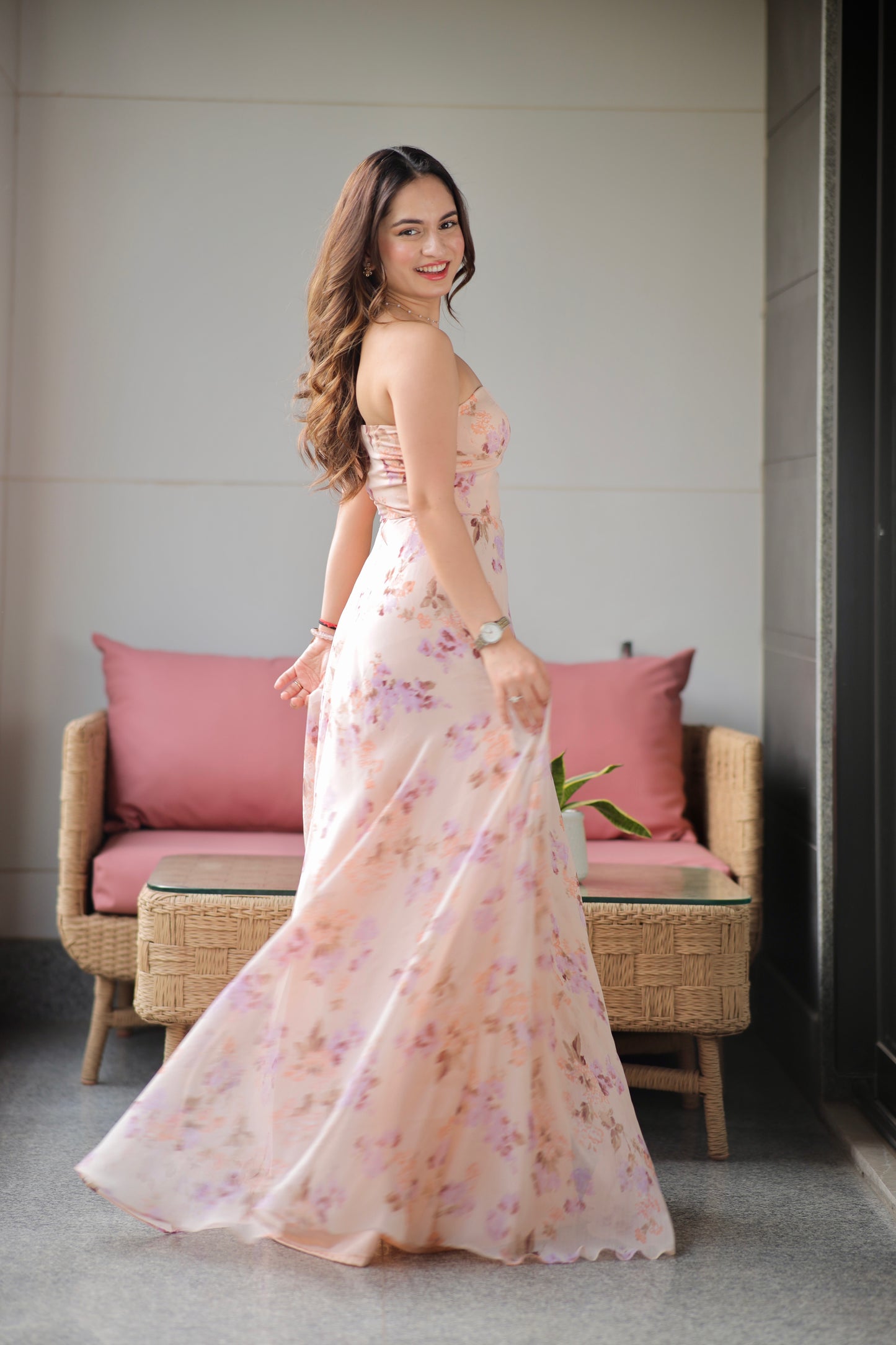 Rachel blush printed tube gown by Imagine By Shiwali featuring a fitted silhouette with a floral print and elegant design.