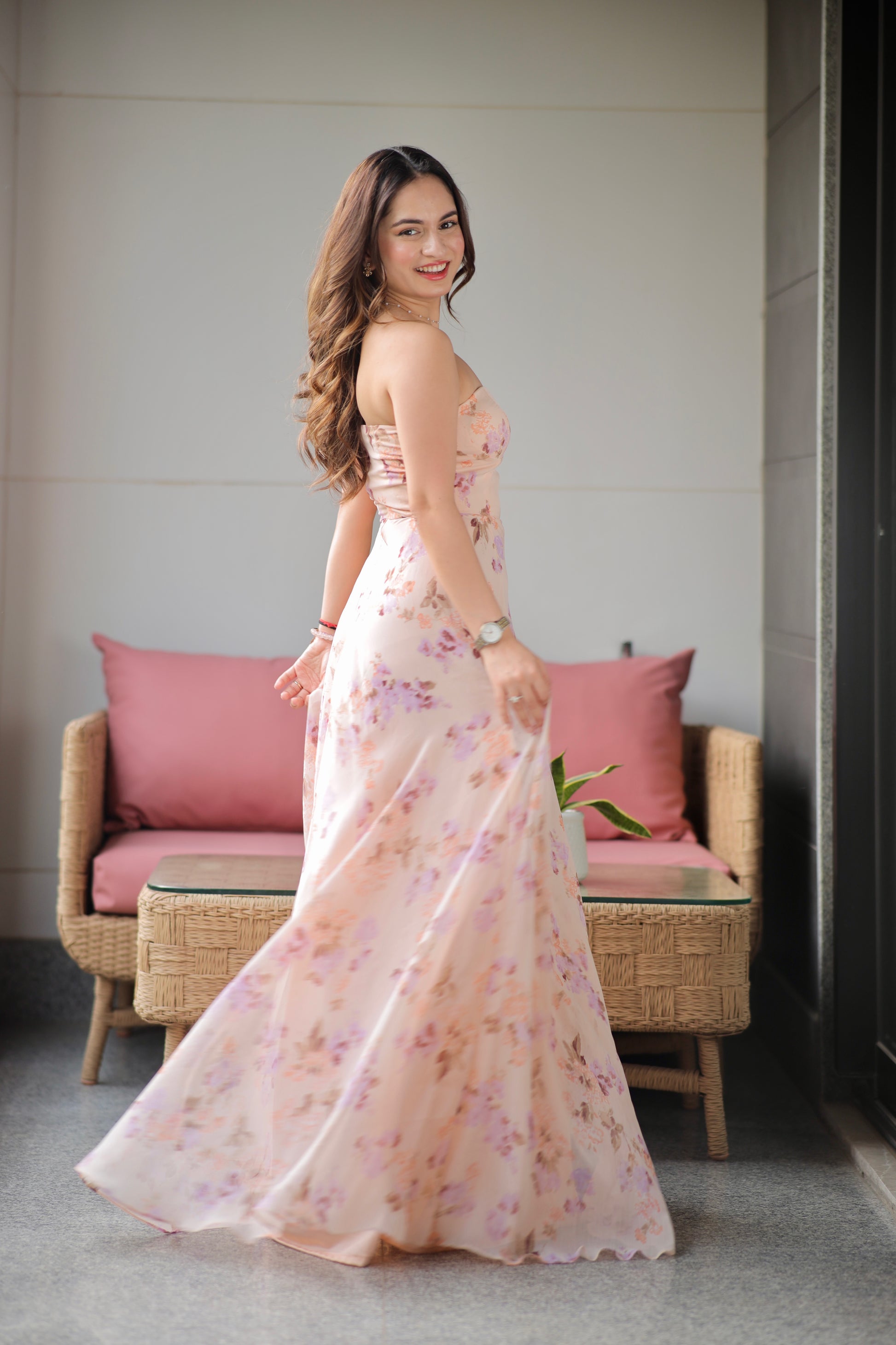 Rachel blush printed tube gown by Imagine By Shiwali featuring a fitted silhouette with a floral print and elegant design.