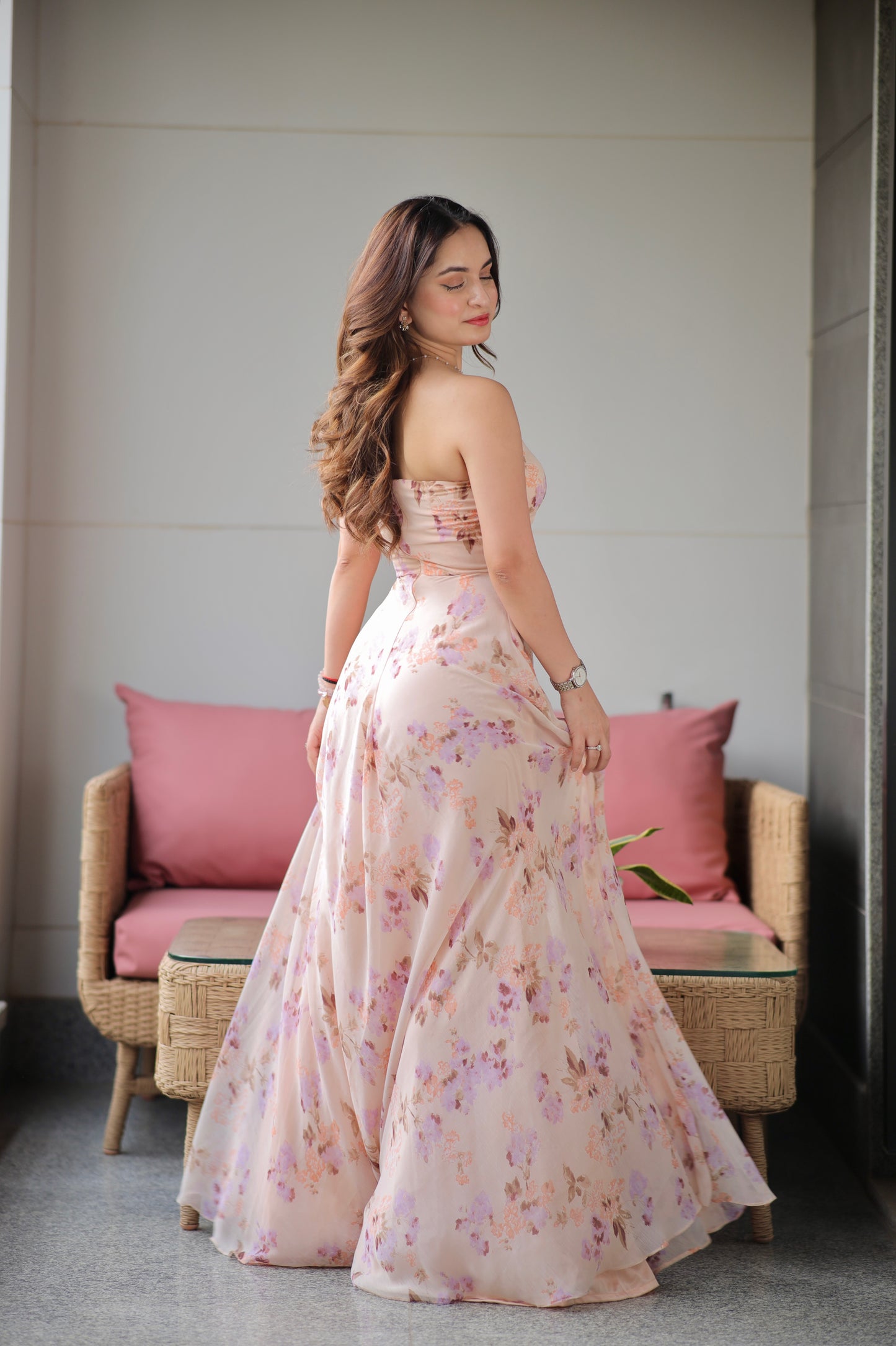 Rachel blush printed tube gown by Imagine By Shiwali featuring a fitted silhouette with floral print and elegant design.