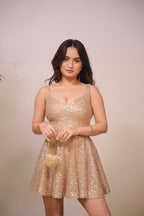Imagine By Shiwali Sam golden dress featuring elegant fabric and stylish design, showcased in a well-lit photography.