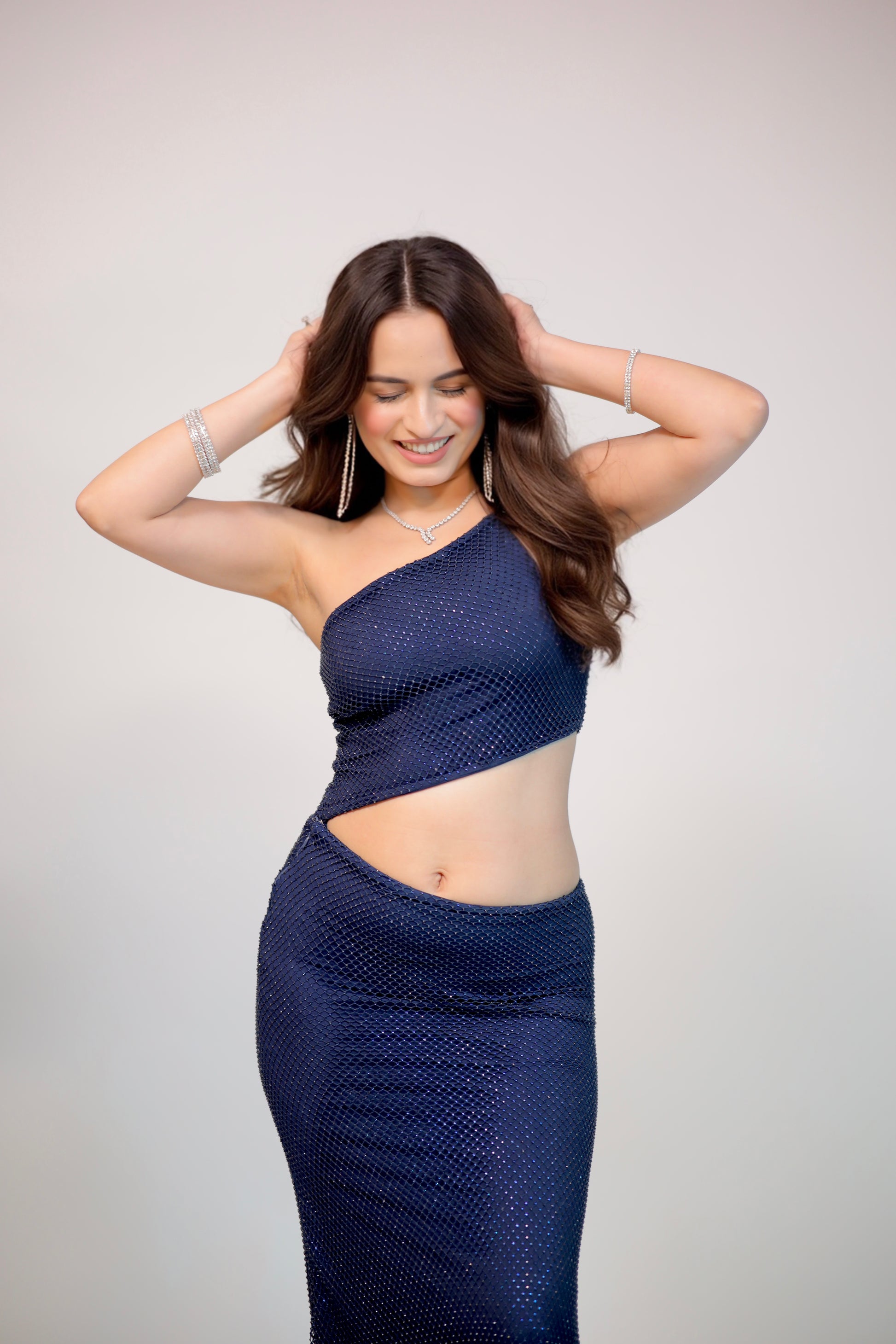 Navy blue Sally skirt set by Imagine By Shiwali featuring a stylish coordinated top and skirt, displayed on a model.