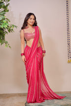 Pink pre-draped saree from Imagine By Shiwali featuring elegant fabric and intricate detailing, styled for a graceful look.