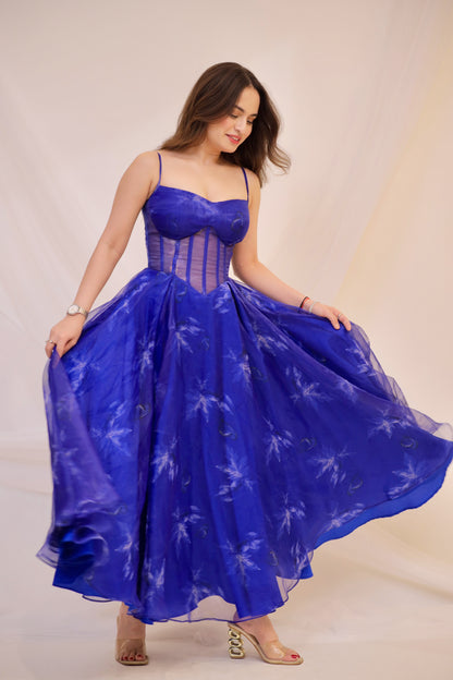 Dream blue electric gown by Imagine By Shiwali featuring flowing fabric and elegant design, shown in a close-up front view.