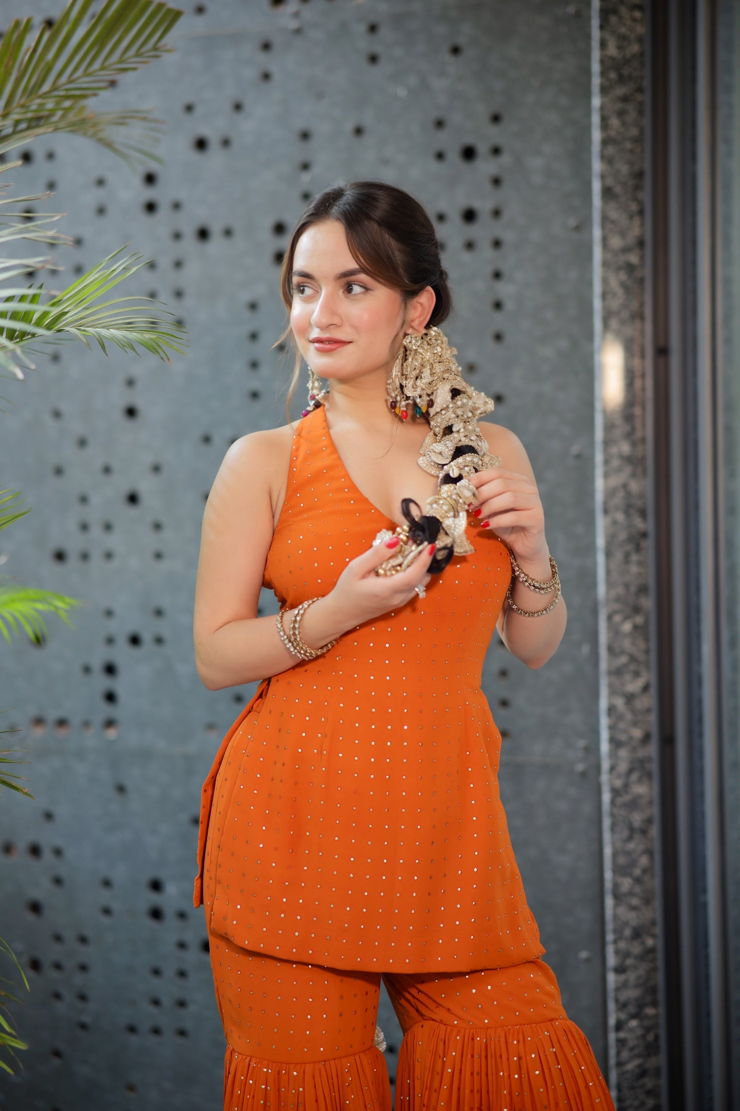 Rust-colored Ananya Sharara suit from Imagine By Shiwali, featuring traditional design and intricate detailing.