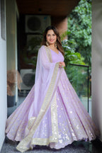 Lilac Sabya Anarkali dress by Imagine By Shiwali, featuring intricate embroidery and flowing fabric.