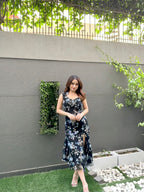 Black printed lace midi dress by Imagine By Shiwali, featuring elegant lace details and a flowing silhouette.
