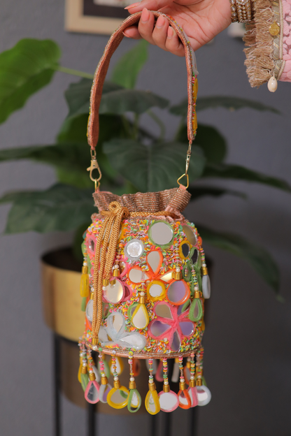 Multicolour Chameli bag by Imagine By Shiwali featuring geometric patterns and a stylish, vibrant design.