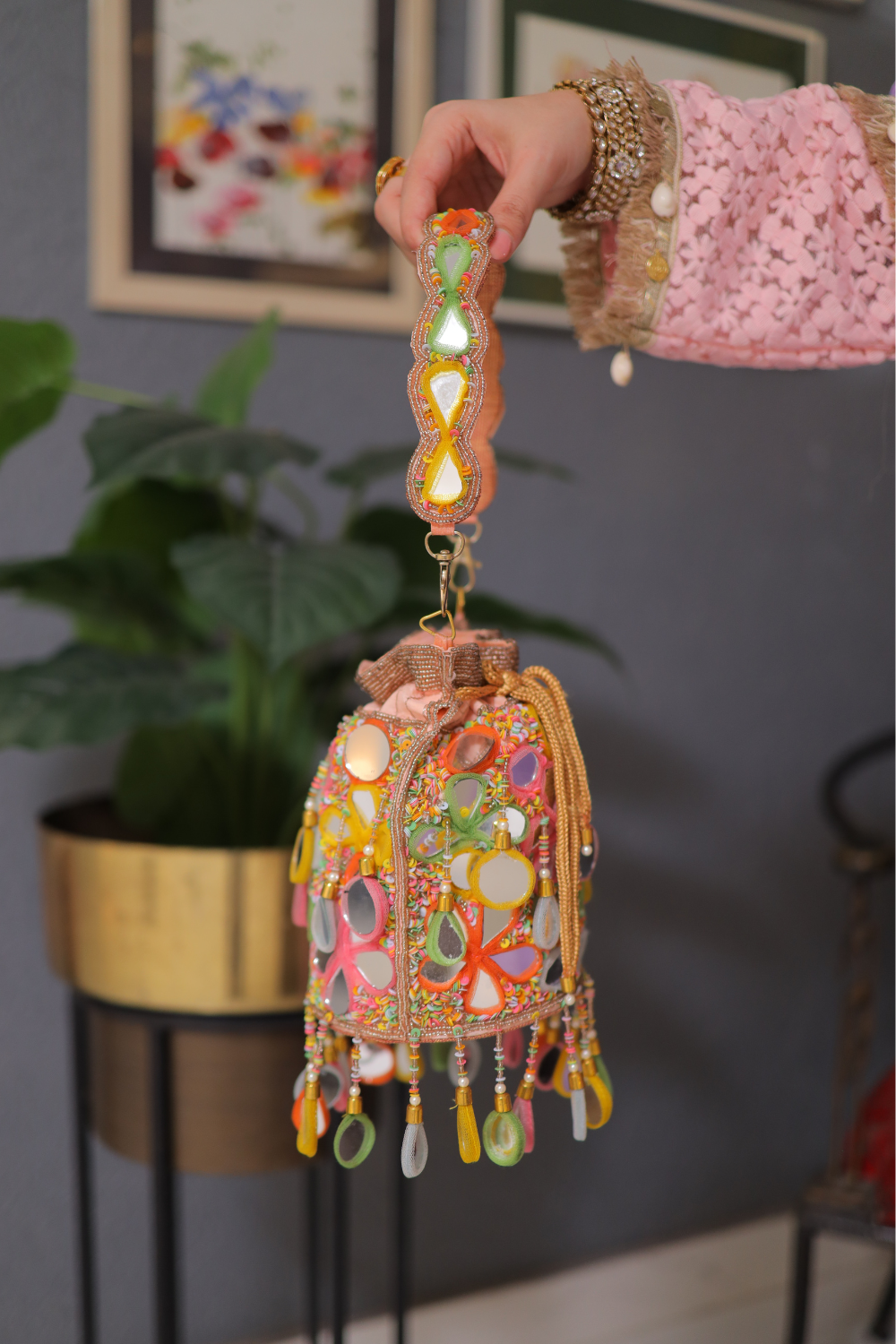 Multicolour geometric Chameli bag by Imagine By Shiwali with vibrant patterns and a stylish design.