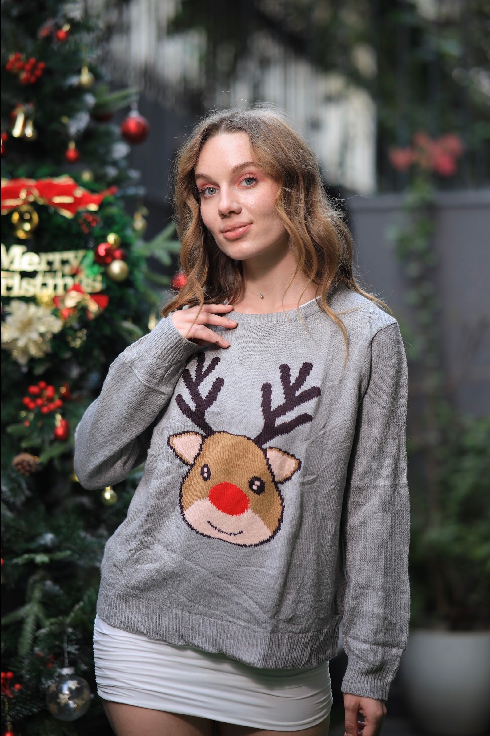 Imagine By Shiwali oversized deer sweater featuring a cozy design and festive deer pattern in soft knit fabric.
