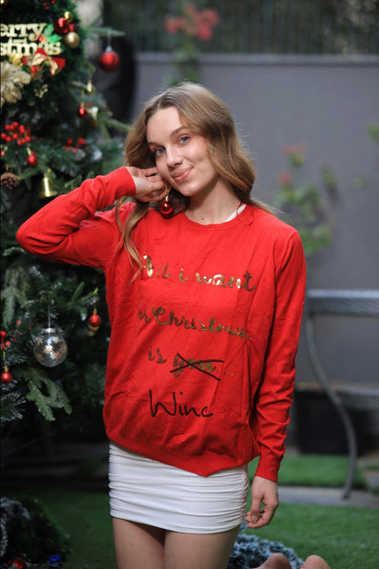 Oversized Merry Christmas sweater by Imagine By Shiwali featuring festive holiday design and cozy knit fabric.