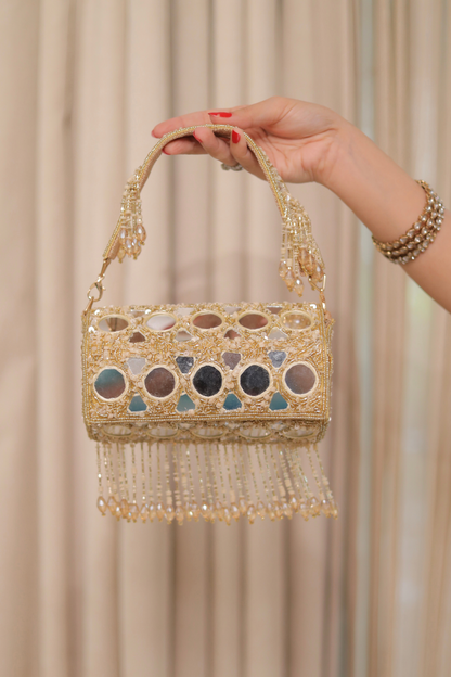 Imagine by Shiwali Rimjim mirror bag with a sleek design, featuring a reflective mirror surface and one-size fit.