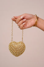 Golden Sam Heart Bag by Imagine By Shiwali, featuring a stylish heart-shaped design and a sleek, contemporary look.