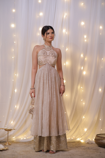 Champagne gold halter Anarkali set with mirror embellishments from Imagine By Shiwali, featuring intricate embroidery and elegant design.