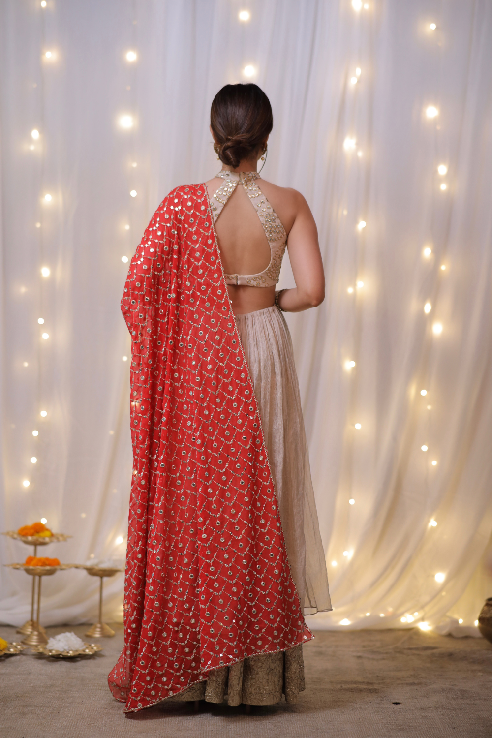 Champagne gold halter Anarkali set with mirror embellishments by Imagine By Shiwali, featuring intricate embroidery and elegant design.