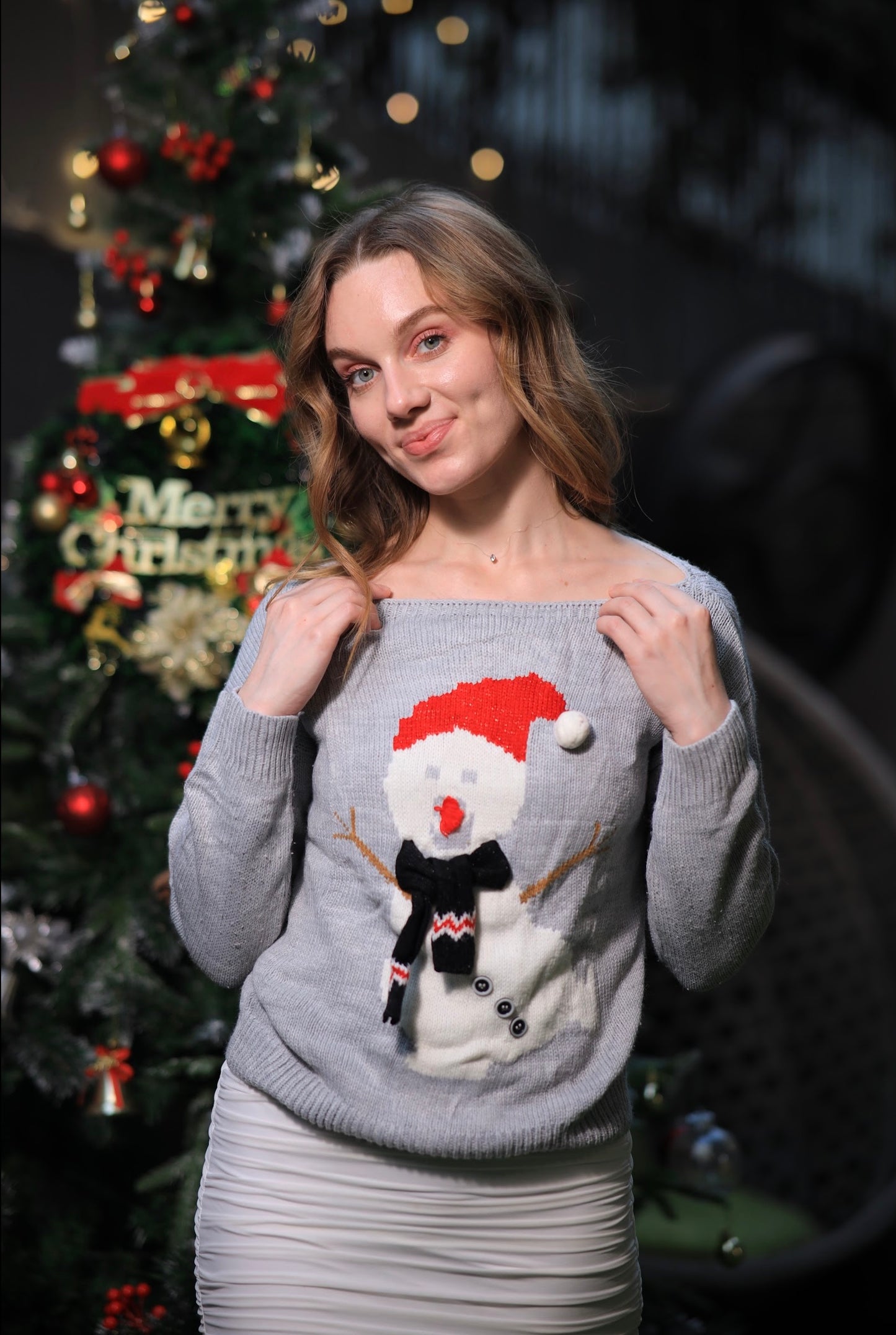Oversized Dancing Snowman Sweater by Imagine By Shiwali featuring a festive snowman design on soft knit fabric.