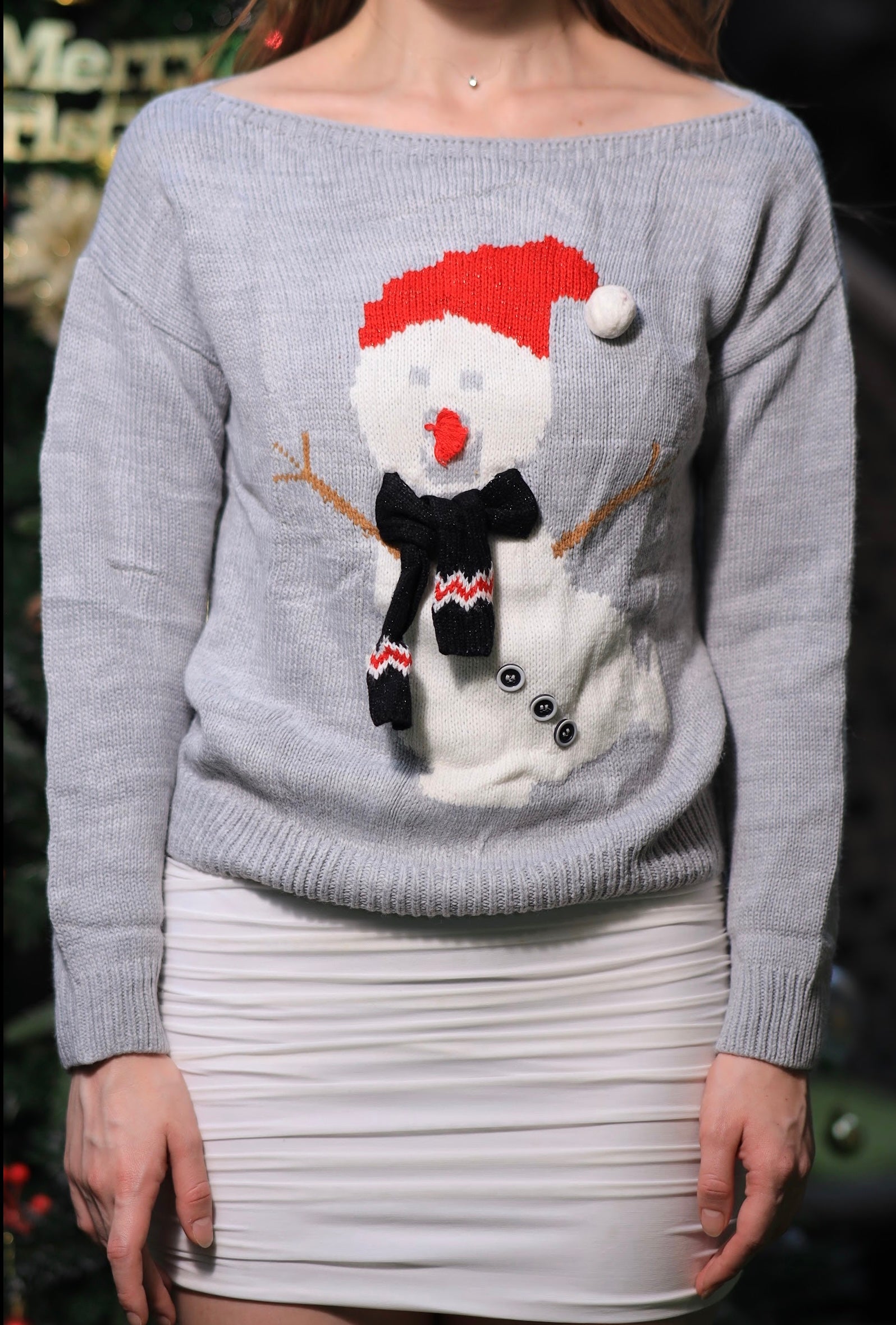 Oversized Dancing Snowman Sweater by Imagine By Shiwali featuring a festive snowman design on soft knit fabric.