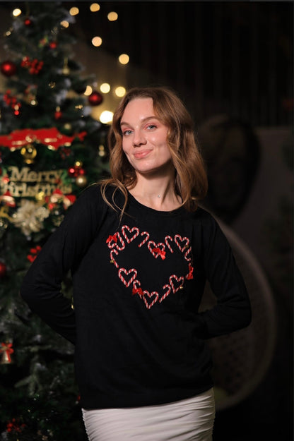 Imagine By Shiwali oversized hearts sweater in size S, featuring a cozy knit with red heart patterns on a soft fabric.