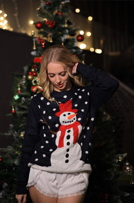 Cute snowman figure by Imagine By Shiwali featuring a classic snowman with a scarf and buttons, perfect for winter decor.
