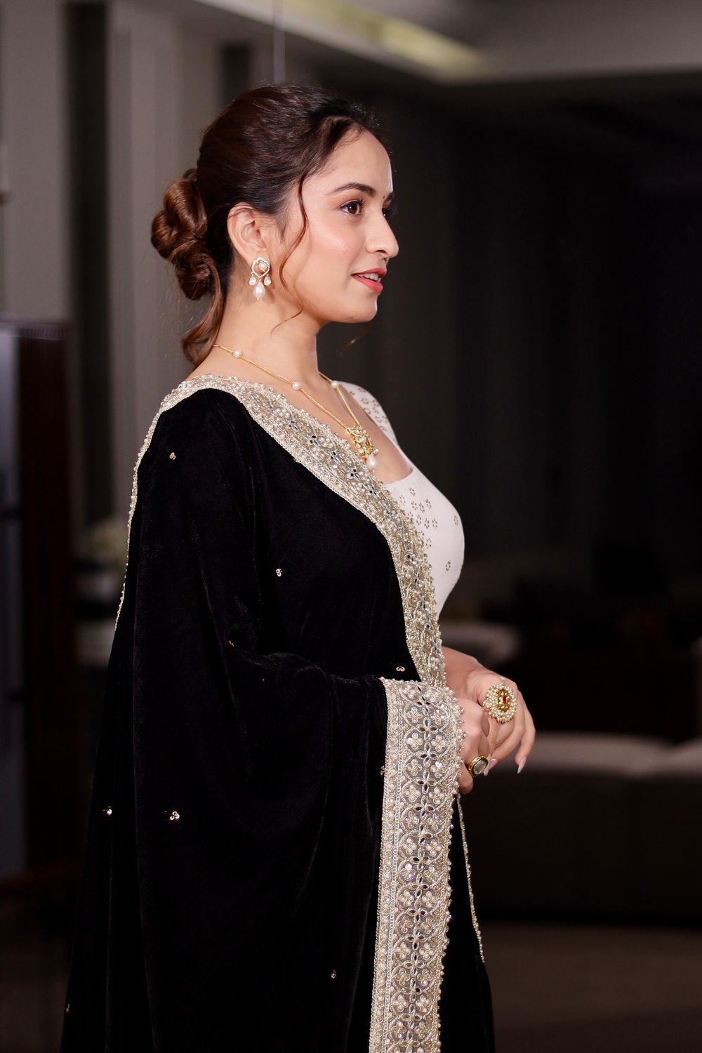 Black Maastani velvet shawl by Imagine by Shiwali, featuring soft luxurious fabric and elegant drape.