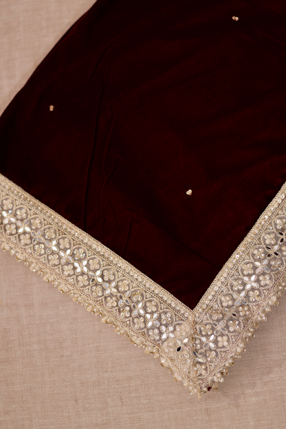 Wine-colored Maastani Velvet Shawl by Imagine By Shiwali draped showing its soft velvet texture and elegant design.