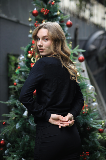 Imagine by Shiwali oversized elf sweater featuring a cozy, festive design with a relaxed fit and festive holiday style.