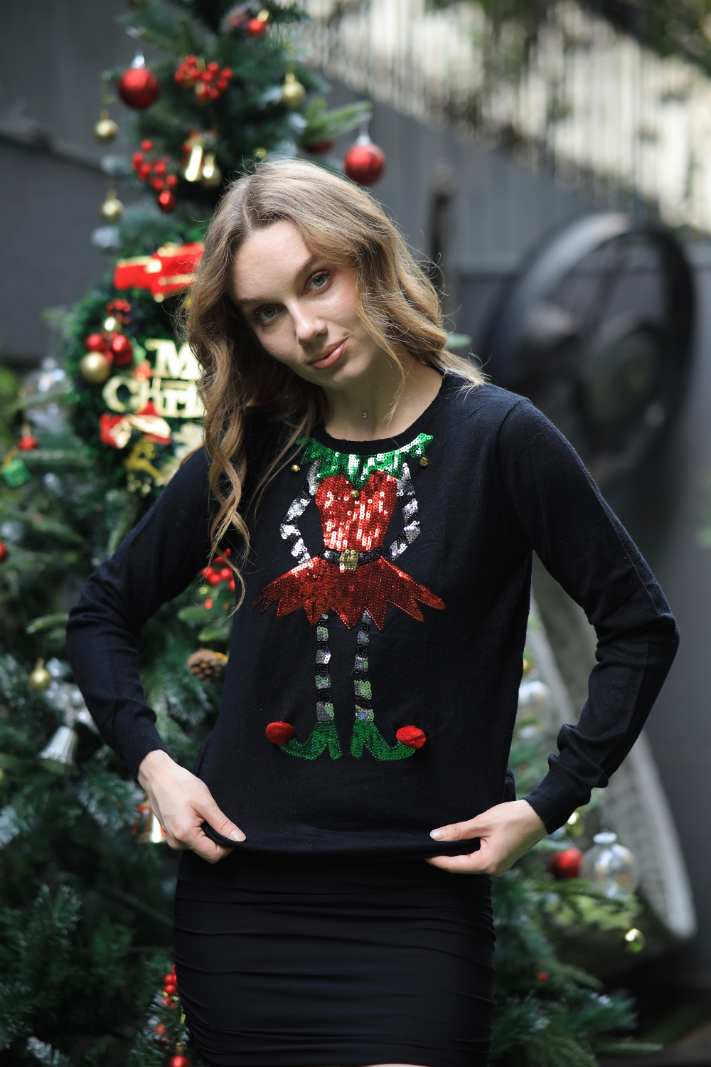 Imagine By Shiwali oversized elf sweater in soft knit with festive green and red colors, featuring a cozy, relaxed fit.