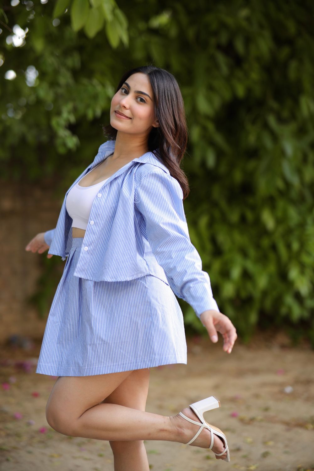 Imagine by Shiwali blue golf shirt and skirt set, lightweight cotton, casual sportswear for women, worn together in a casual golf style.
