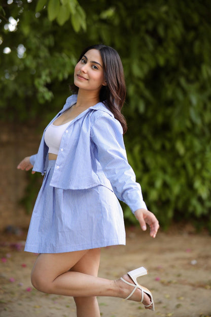 Imagine by Shiwali blue golf shirt and skirt set, lightweight cotton, casual sportswear for women, worn together in a casual golf style.