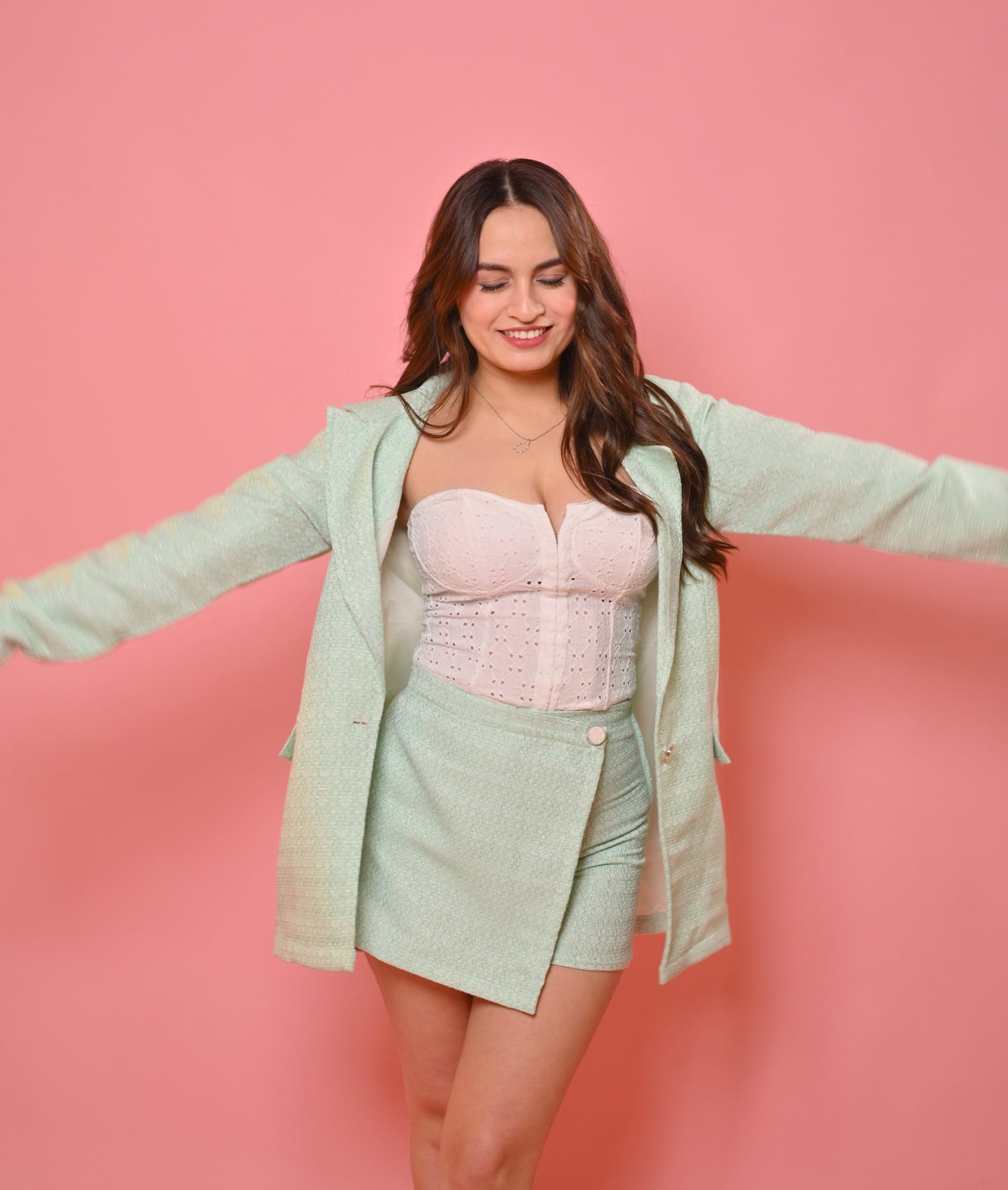 Mint green tweed blazer and skirt set by Imagine By Shiwali, featuring a tailored blazer with matching skirt and lycra lining.