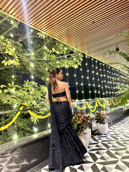Navy blue BEBO pre-draped saree by Imagine By Shiwali, showcasing elegant fabric and intricate draping style.