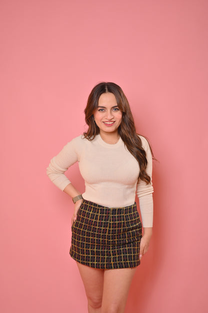 Black tweed skirt by Imagine By Shiwali, shown in size XS with a classic textured fabric and tailored fit.