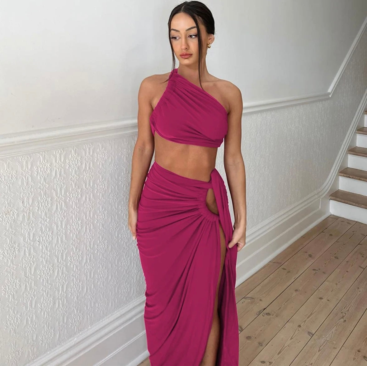 Hot pink ruched tank crop top and slit skirt by Imagine By Shiwali, styled together in a fashionable ensemble.
