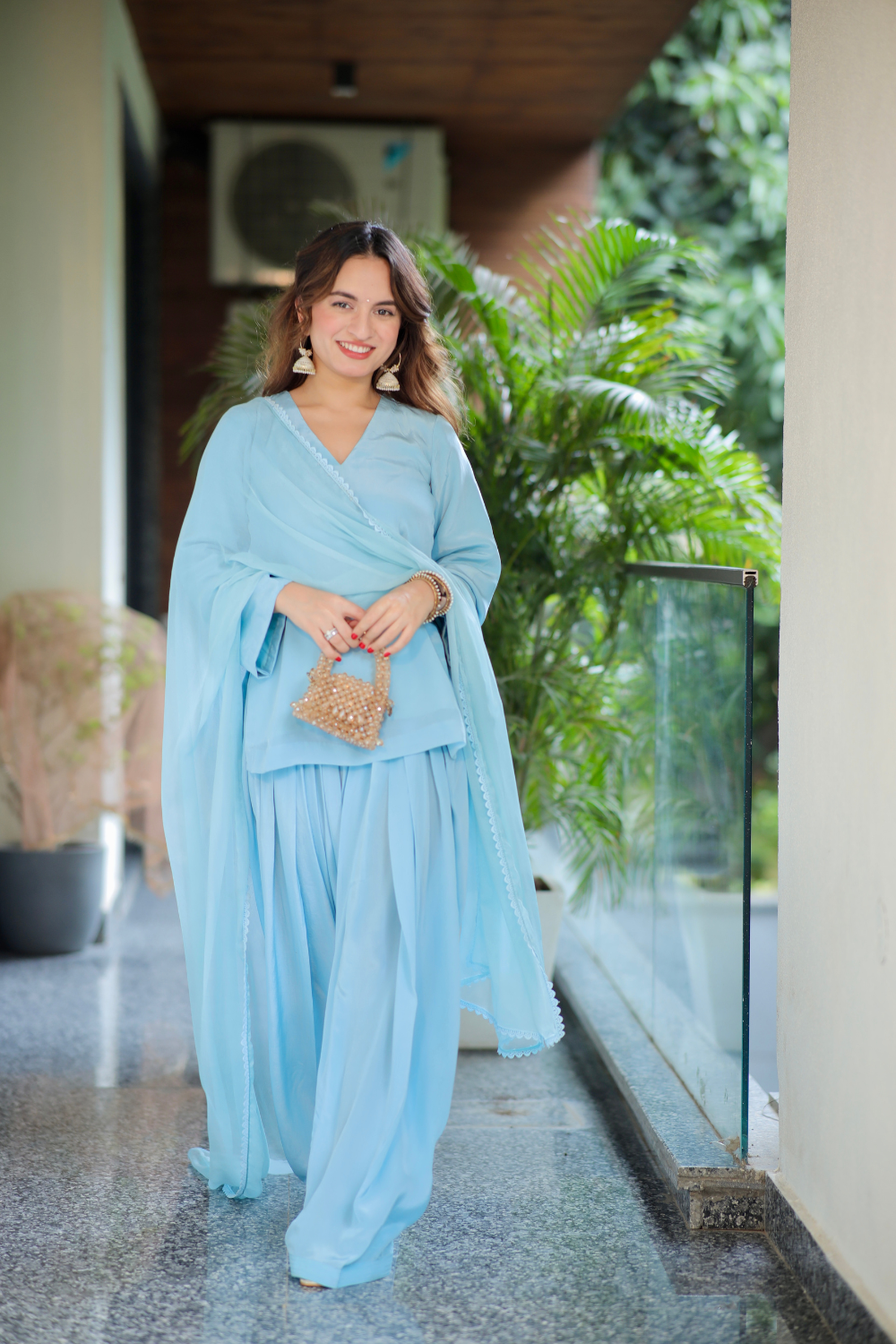 Imagine by Shiwali Sana blue short kurti and matching salwar set, featuring intricate embroidery and lightweight fabric.