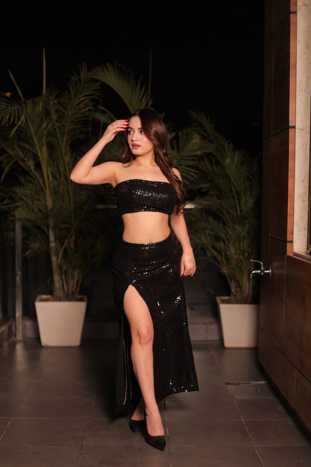 Victoria Black sequins co-ord set with satin lining and slit skirt, designed by Imagine By Shiwali, shown on a model.