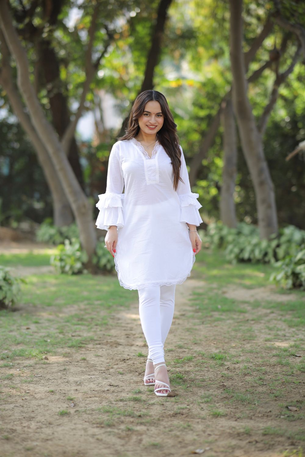 Pure white cotton kurti by Imagine By Shiwali, showcasing a comfortable, traditional Indian top with simple, elegant design.