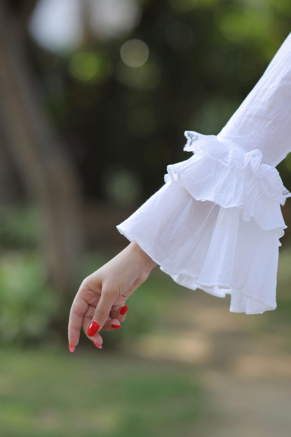 Pure white cotton kurti by Imagine By Shiwali, showcasing a comfortable, stylish traditional Indian dress with a simple design.