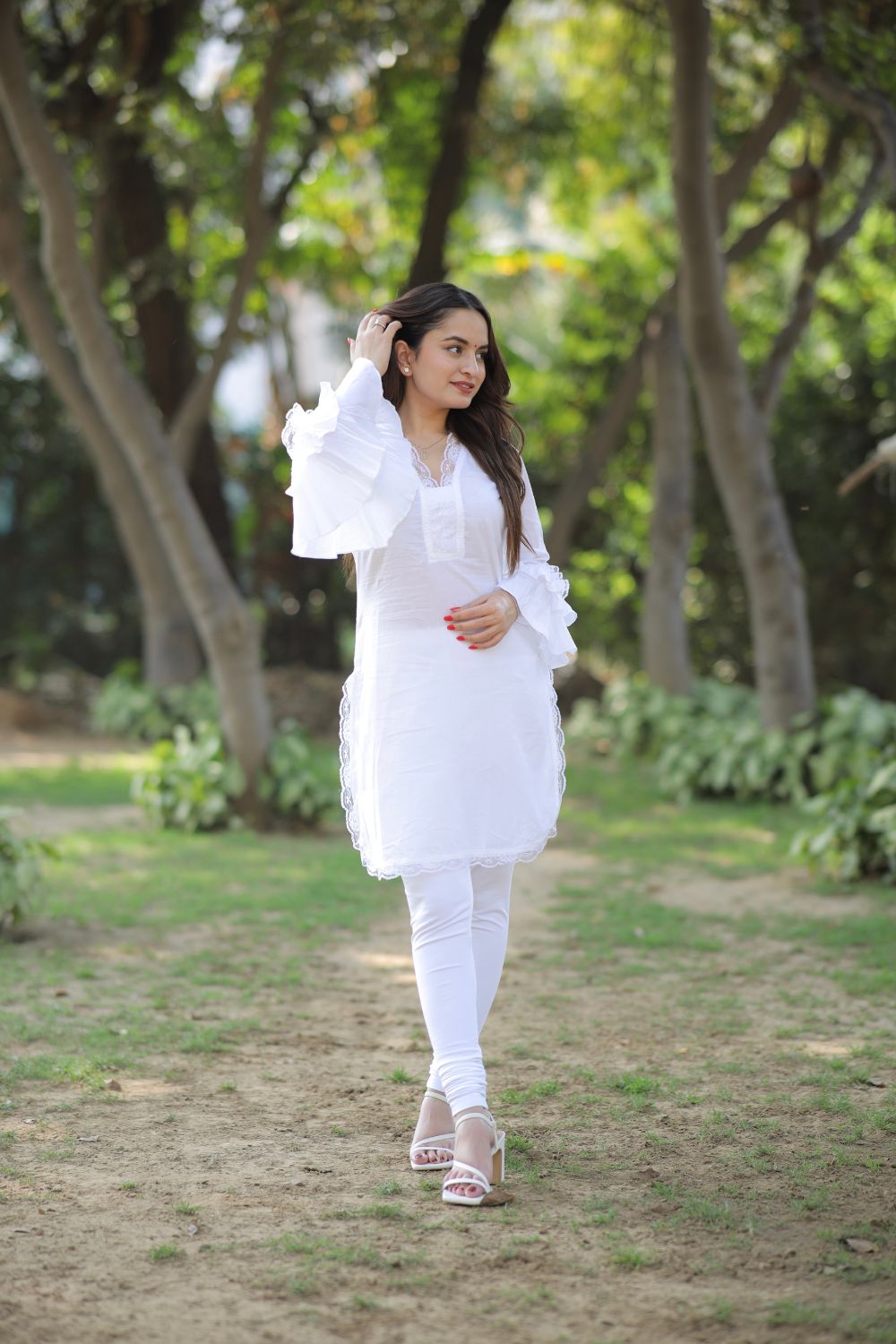 Pure white cotton kurti by Imagine By Shiwali, showcasing a comfortable, traditional Indian kurti with simple, elegant design.