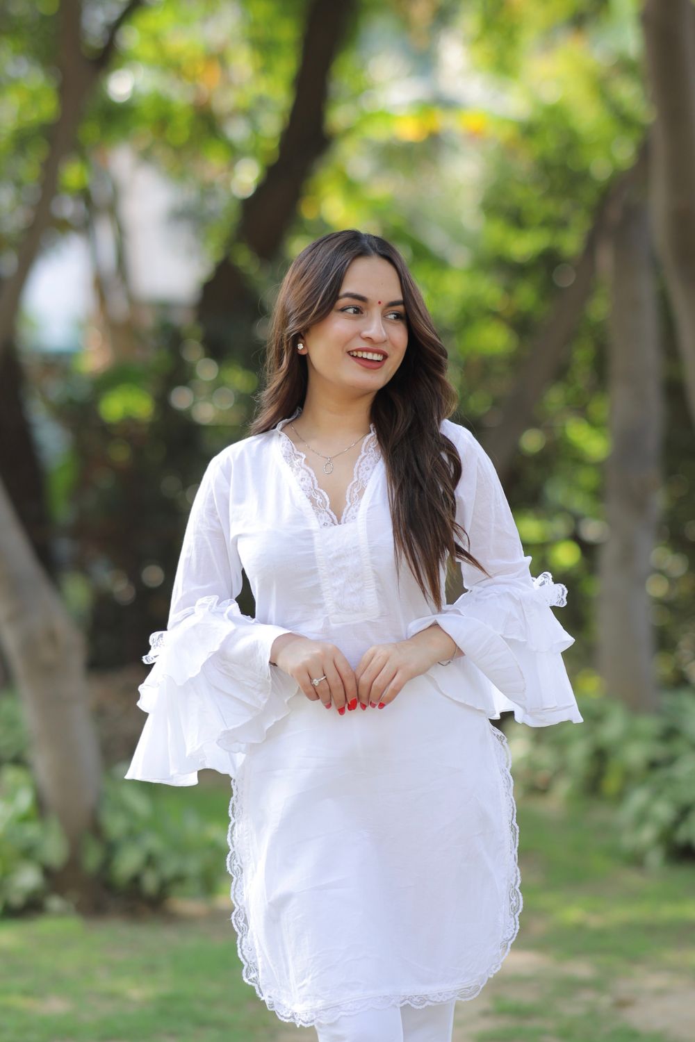 Pure white cotton kurti from Imagine By Shiwali, showcasing a comfortable, stylish traditional Indian tunic with intricate details.