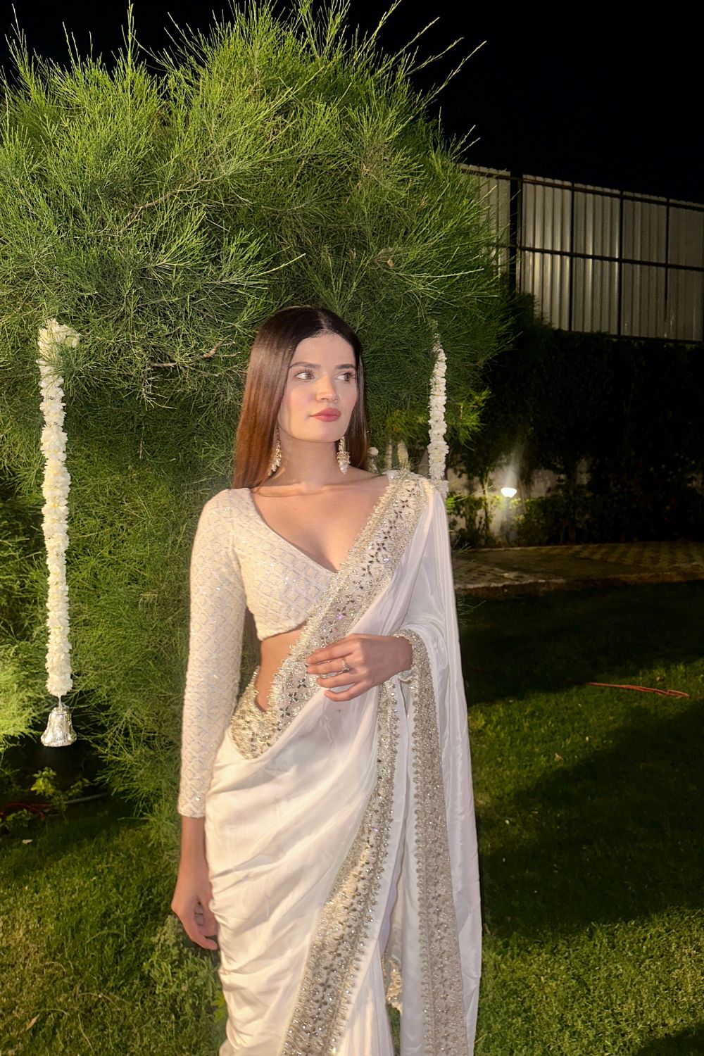White Maastani Mulmul Saree by Imagine By Shiwali displayed flat, showcasing its soft, lightweight fabric without a blouse.