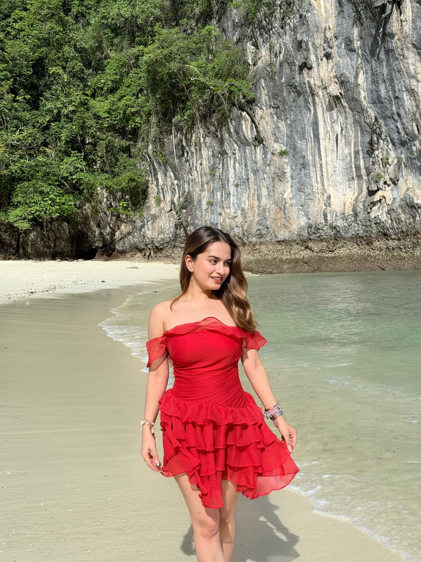 Imagine by Shiwali Casey Red Dress displayed on a hanger, showcasing a stylish sleeveless design with a fitted silhouette.