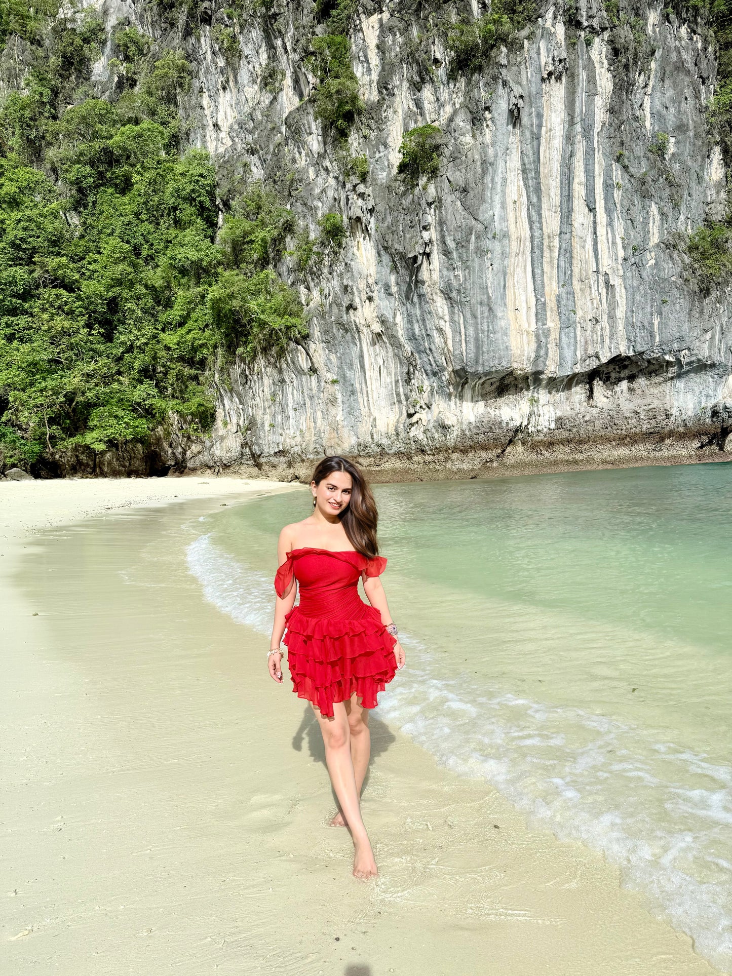 Imagine by Shiwali Casey red dress displayed on a hanger with vibrant fabric and stylish design, suitable for casual or semi-formal wear.