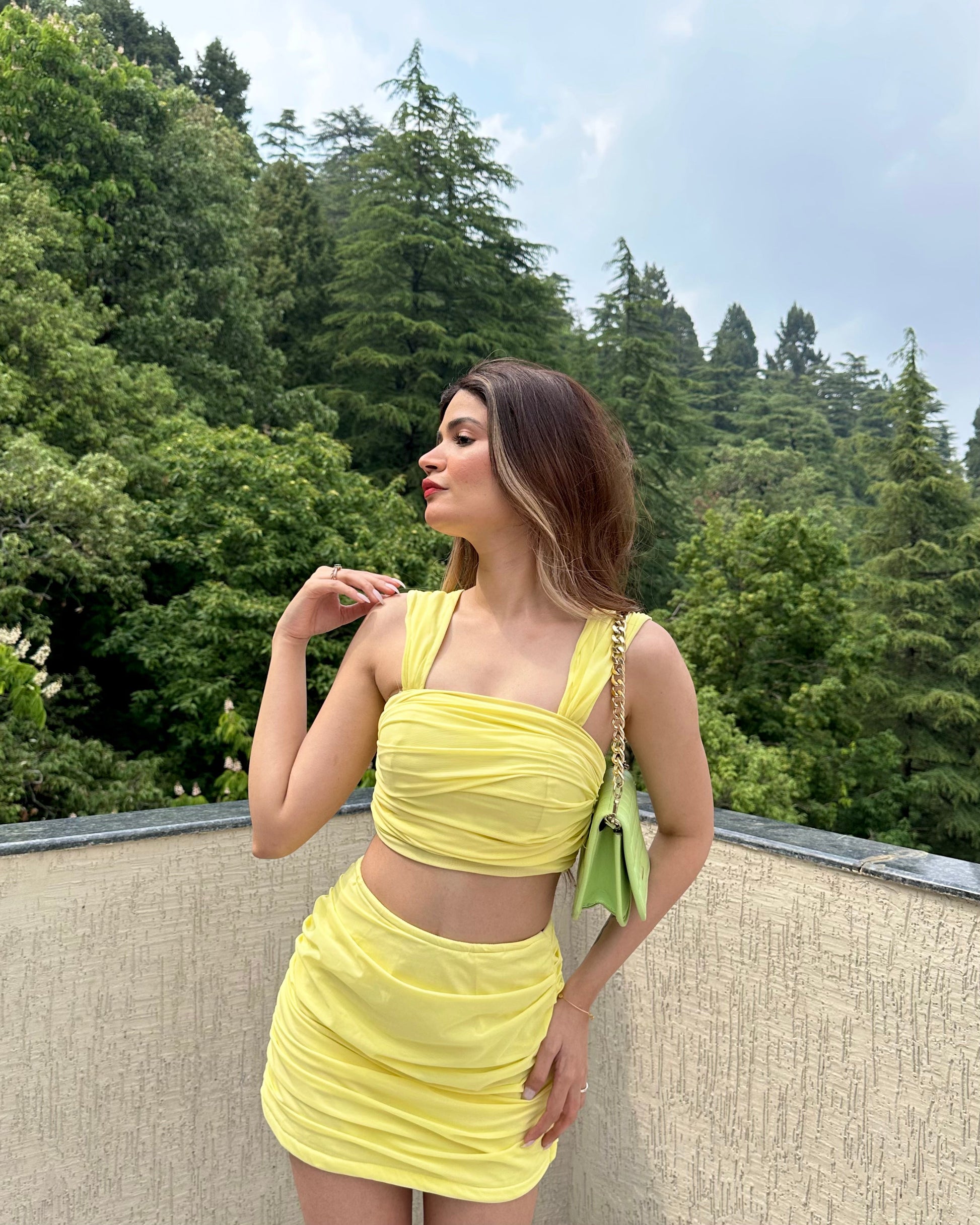 Yellow Jo crop top and mini skirt set by Imagine By Shiwali, featuring a stylish crepe fabric design.