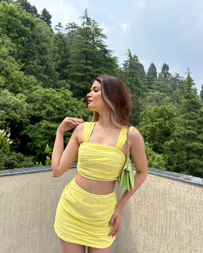 Yellow Jo crop top and mini skirt set by Imagine By Shiwali, featuring a stylish crepe fabric design.