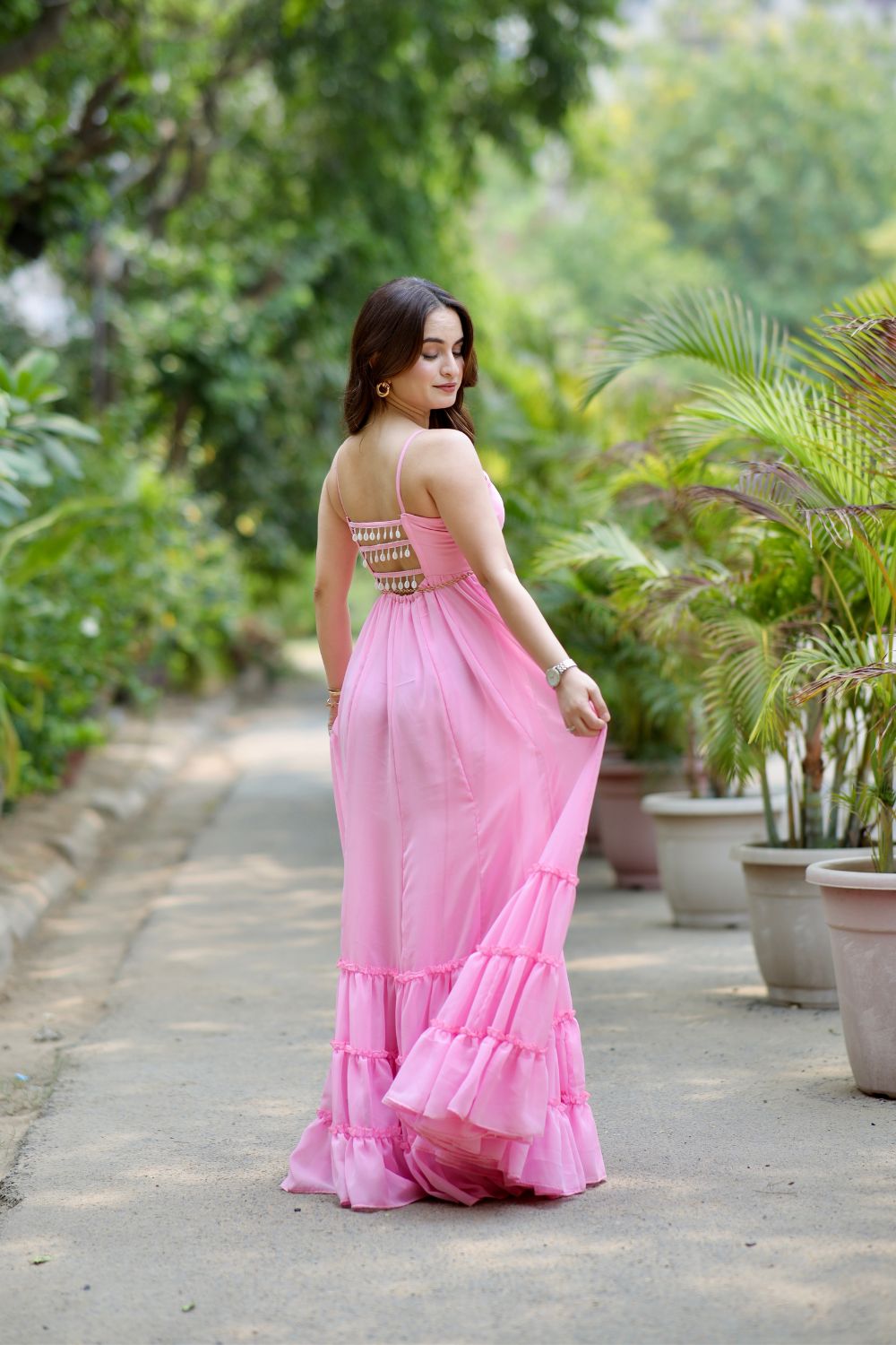 Pink Diya Gown by Imagine By Shiwali, featuring intricate embroidery and flowing fabric, displayed on a mannequin.