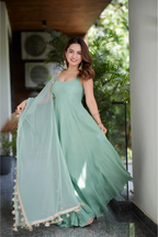 Mint green Dolly Anarkali dress by Imagine By Shiwali featuring intricate embroidery and flowy fabric.