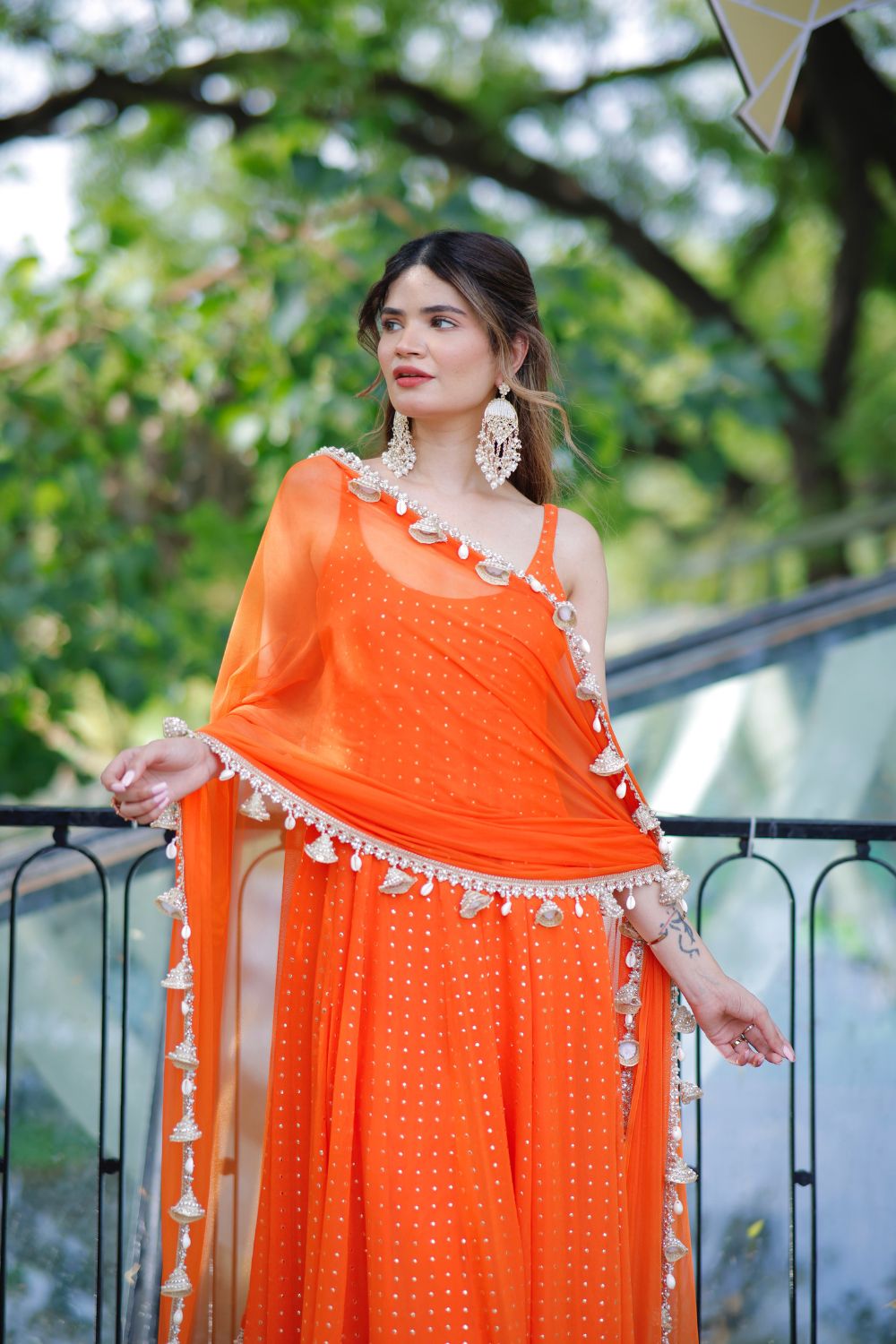 Dolly Orange Anarkali suit by Imagine By Shiwali, featuring traditional embroidery and flowing fabric for festive occasions.